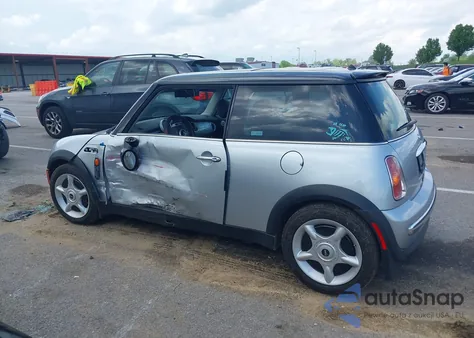 2003 Mini Cooper z USA, uszkodzony, nr VIN WMWRC334X3TC43283